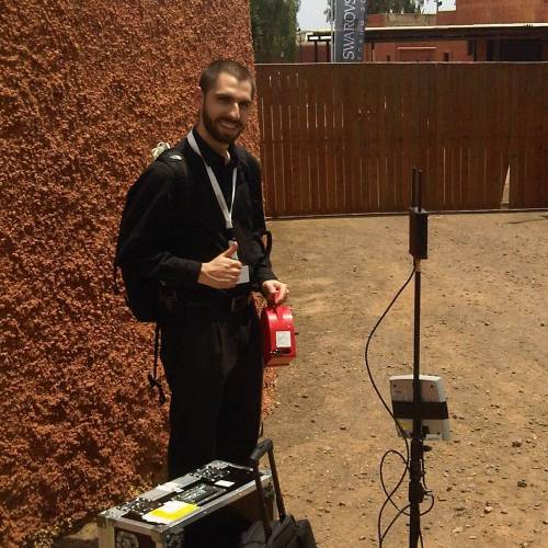 Photo of Ivan with a tripod and a wifi access point